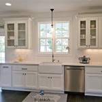 Kitchen With White Cabinets And Grey Walls